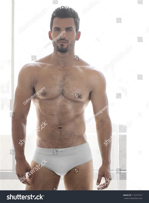 Very Sexy Young Male Muscular Model In White Underwear In Front Of