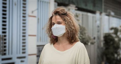 Woman Wearing Facial Disposable Mask Coronavirus Protection Stock