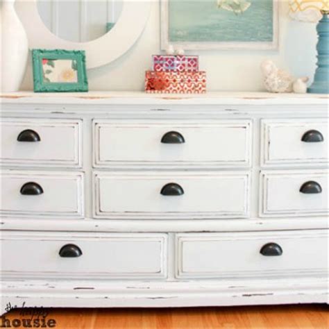 This will help prevent the paint from drying and clogging the tip. White Chalky Paint Dresser Makeover - The Happy Housie