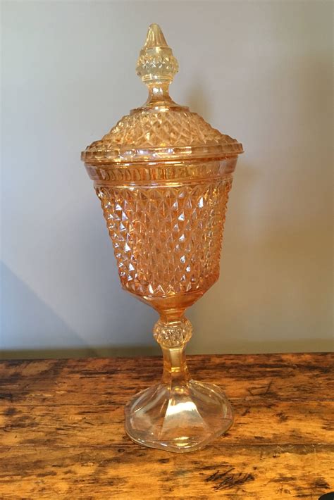 Glass candy jar with lid, elegant sugar bowl decorative cookie dish buffet storage container clear, ideal for home, office and party wedding, 11x9.5cm 4.0 out of 5 stars 217 $16.99 $ 16. Carnival Glass Apothecary Candy Dish/Amber color carnival ...