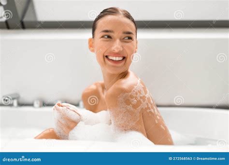 Happy Lady Taking Bath Relaxing Sitting In Bathtub In Bathroom Stock Image Image Of Bathtub