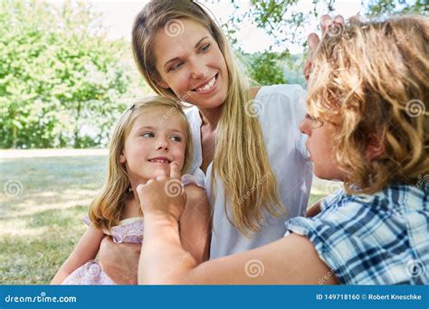 Mother Strokes Her Son S Hair Stock Photo Image Of Family Mother