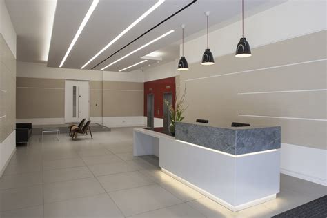 The working countertop is in height of 750mm for computer area. Bespoke Reception Desk Design | Fusion Executive Furniture