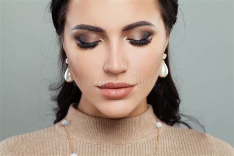 Beautiful Woman Face Jewelry Model With Makeup Pearls Earrings