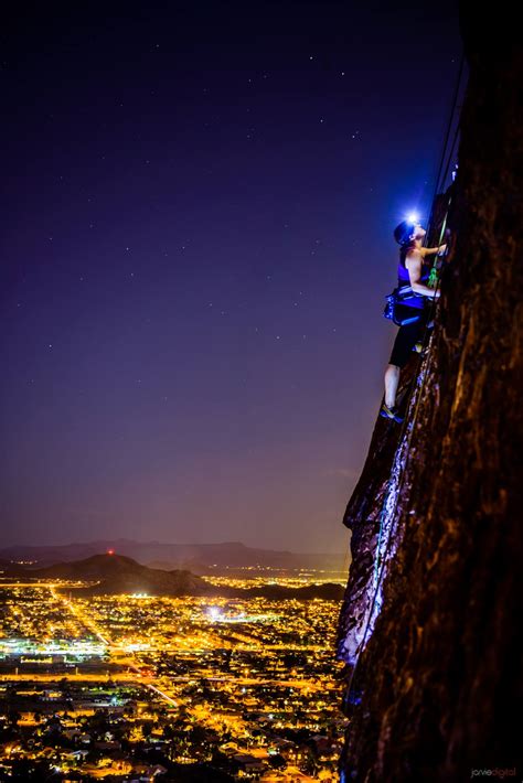 Spectacular Photo Of A Woman Climbing A Vertical Rock Wall At Night Gizmodo Australia