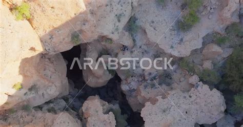 Drone Photography Of Mountain Climbers Near Majlis Al Jinn Cave The