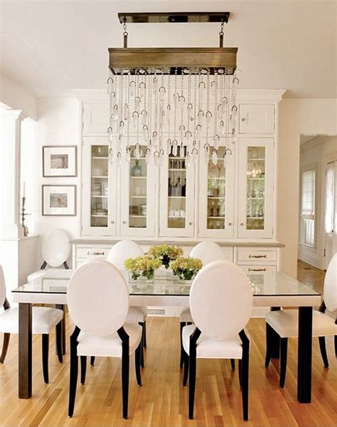 Crystal Drop Chandelier In White Dining Room Built In Cabinets Elegant