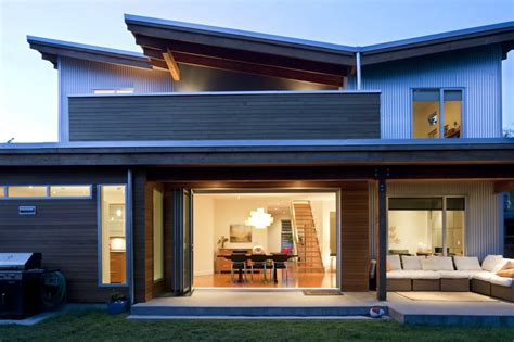 The house is entered via a courtyard on the left side, with the carport to the left and the pool directly behind the house. Contemporary Home, Tsawwassen BC - John Gower Design