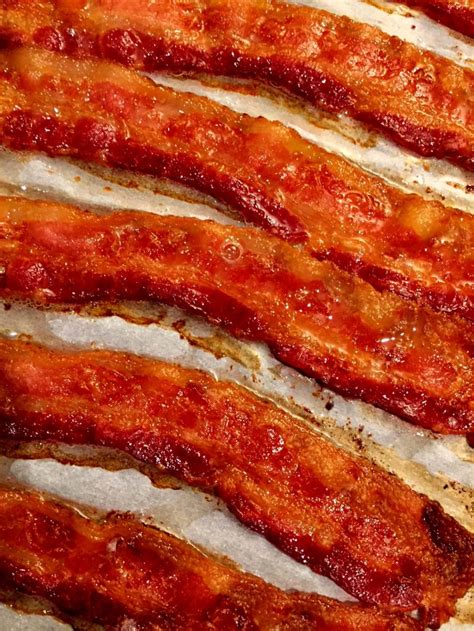 An alternative is placing your bacon onto a baking rack that rests on top of a sheet pan. Crispy Baked Bacon - How To Cook Bacon In The Oven ...