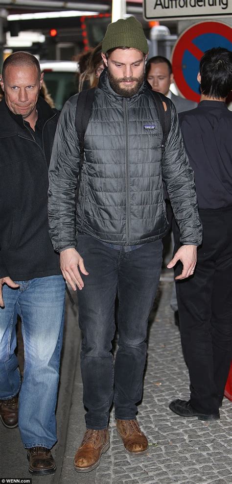 Jamie Dornan Arrives In Berlin As He Hits Back At