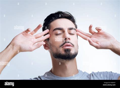 Serious Upset Person Closing His Eyes While Thinking Stock Photo Alamy