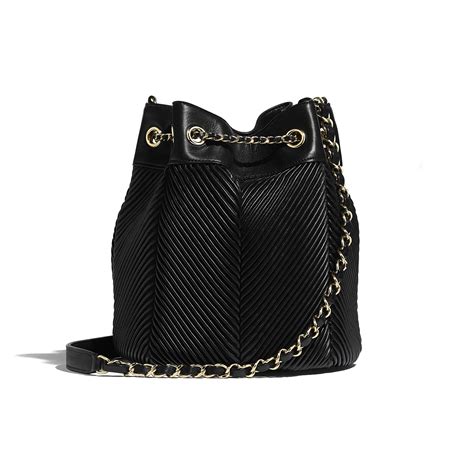 Chanel double crystal cc earrings silver & gold tone 21a. Lambskin Gold-Tone Metal Black Drawstring Bag | CHANEL
