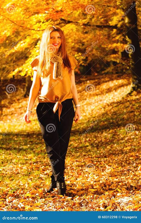 Woman Fashion Girl Relaxing Walking In Autumnal Park Outdoor Stock