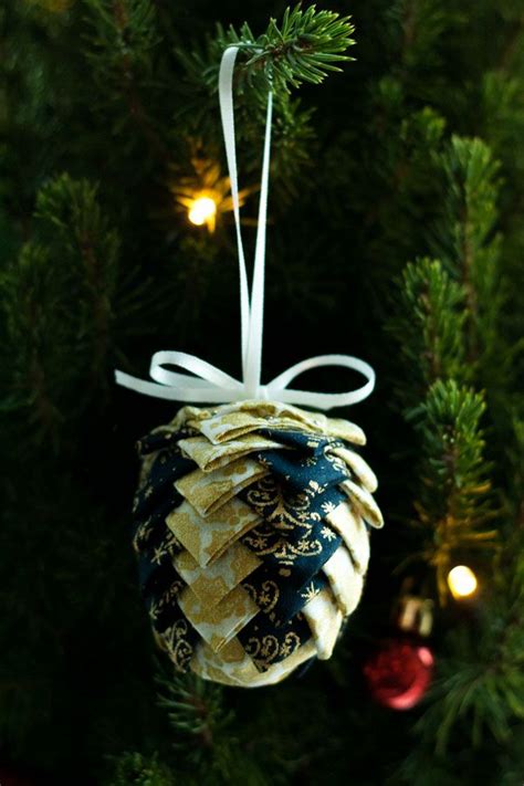 Did you know you can save some money and a trip to the store by learning how to make fabric buttons? No Sew Fabric Pinecone Ornaments | Sewn christmas ...