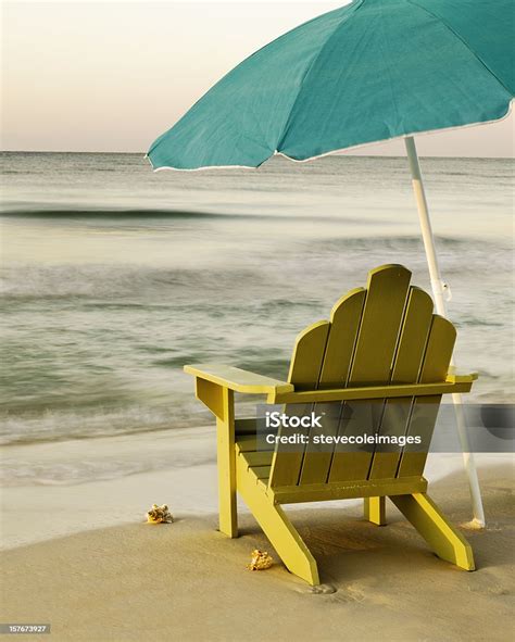 Adirondack Chair On Beach With Unbrella Stock Photo Download Image