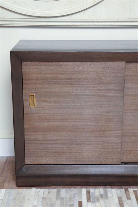Back of door storage cabinet. Sliding Door Storage Cabinet For Sale at 1stdibs