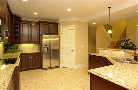 Functional design that allows ample room to move about can help you better enjoy your space. Tile kitchen floor. Corner pantry. Stainless steel ...