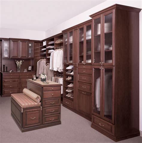 Custom Walk In Closet With Island And Bench Traditional Closet