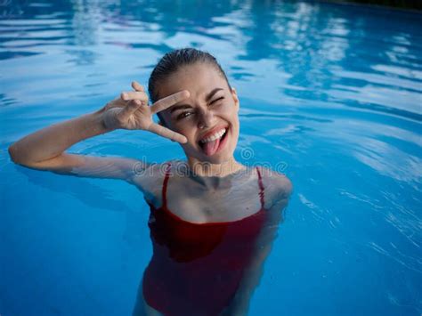 Cheerful Woman Swimming In The Pool Nature Emotions Hand Gestures Stock