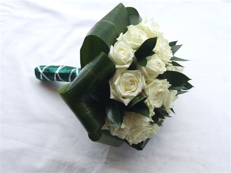 Maybe you would like to learn more about one of these? RJ's Florist: Emerald green and ivory wedding flowers