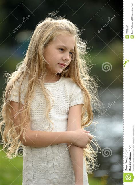 Beautiful Little Blonde Girls Outdoors Stock Photo