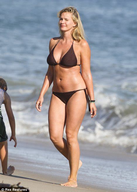 Natasha Henstridge Looks Out Of This World As She Proudly Parades Her Curvy Bikini Body Daily