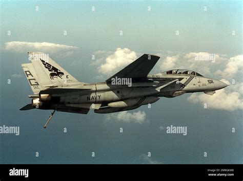 A Fighter Squadron 143 Vf 143 F 14b Tomcat Aircraft Banks To The Left