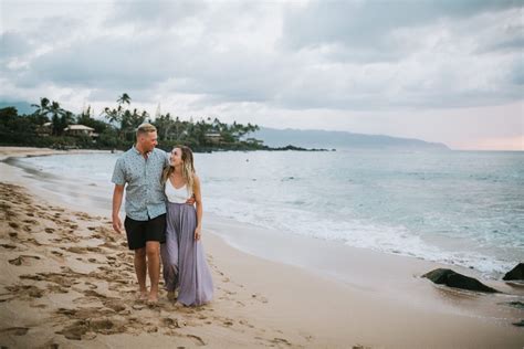 Couple walking on the beach at sunset smiling at each other | Hawaii photographer, Romantic ...