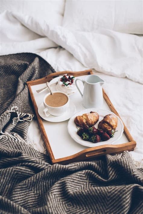 Traditional Romantic Breakfast In Bed In White And Beige Bedroom Stock
