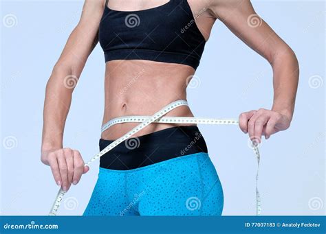 Torso Of Athletic Fitness Woman On A Gray Background Stock Image