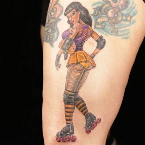 Old Cartoons Style Colored Sexy Pin Up Girl On Rollers Arm Tattoo