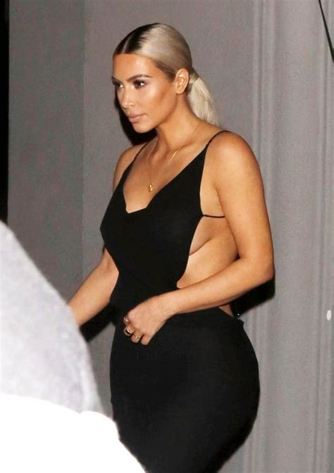 Kim Kardashian Is Rocking Some Serious Side Boob In This Skintight Sheer Dress