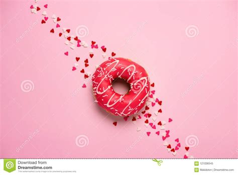 Donuts With Icing On Pastel Pink Background With Copyspace Sweet