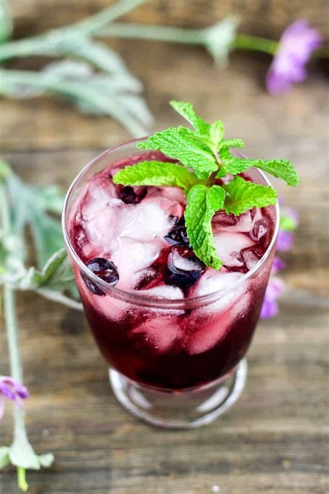 Easy Cherry Vodka Sour With Mint And Blueberry Recipe Sour Foods Cherry Vodka Vodka Sour Recipe