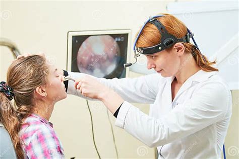 Ear Nose Throat Examining Ent Doctor With A Child Patient And