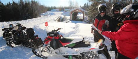 Preparing For A Snowmobile Trip In The Maritime Regions Of