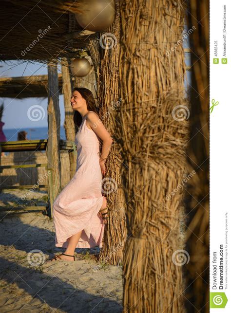 Beautiful Woman Relaxing On The Beach On Sunset Stock Image Image Of