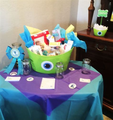 Games have always been a highlight of the baby shower — a great way for guests to mingle and meet each other in activities that encourage informality and relaxation. My sons, Monsters Inc. baby shower. Game table. (With ...