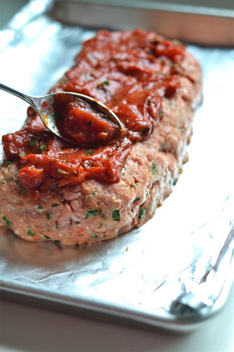 Pack turkey mixture into prepared pan; Tomato Basil Turkey Meatloaf - Little Bits of...