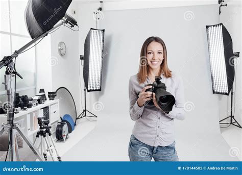 Young Female Photographer In The Studio Stock Photo Image Of