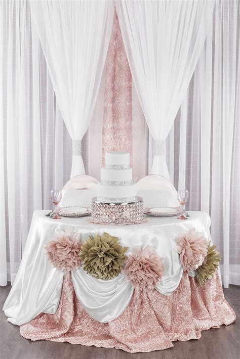 blush and champagne sweetheart table with crystal cake stand also perfect for quinceañeras