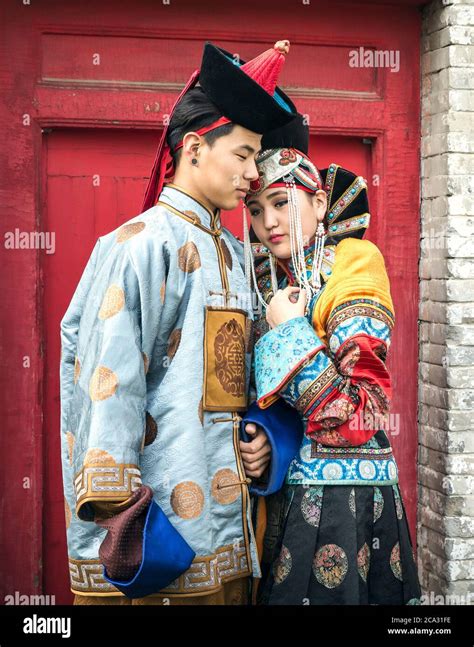 Young Mongolian Couple In Traditional 13th Century Clothing In A Temple