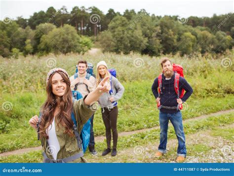 Group Of Smiling Friends With Backpacks Hiking Stock Image Image Of