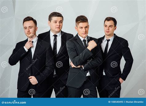 Group Of Men In Suits
