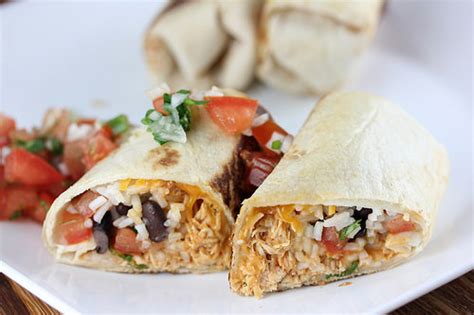 But i don't mind too much, because this weather is perfect for staying. Cheesy Chicken Burritos Recipe - BlogChef