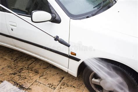 A Car Washed With High Pressure Water Jet Stock Image Image Of
