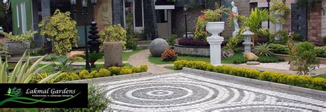 A cool interlocking design is created at ground level with irregular paving planks and lawn. OUR SERVICESDesign and layout of home gardensDesign and ...