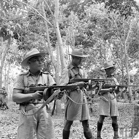Three Malayan Members Of The Fmsvf During The Tommy Gun Training