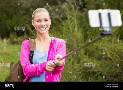 Smiling Female Hiker Taking A Selfie Stock Photo Alamy
