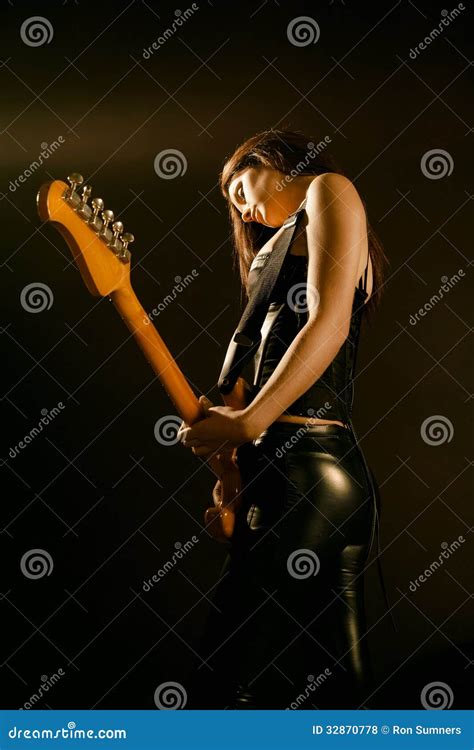 Female Guitarist Playing On Stage Royalty Free Stock Photos Image